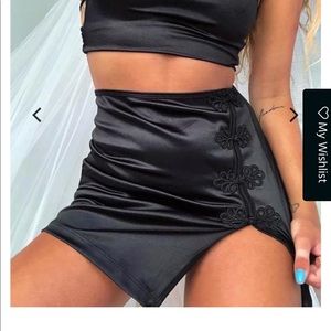 Shena Mini Skirt in Satin Black by Motel rocks